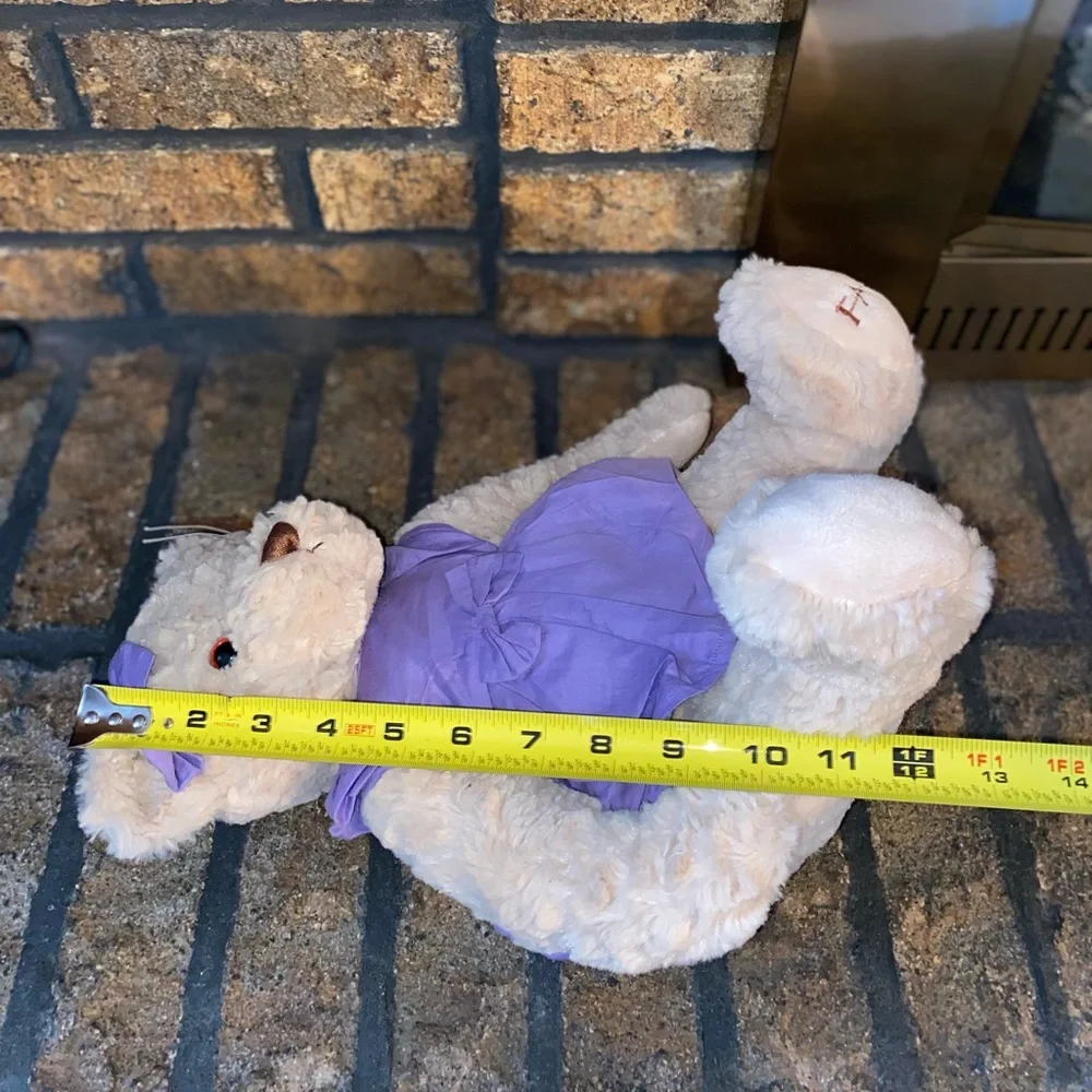 FAO Schwarz bear stuffed animal. 2016 Geoffrey, Purple dress and bow. - Picture 7 of 7